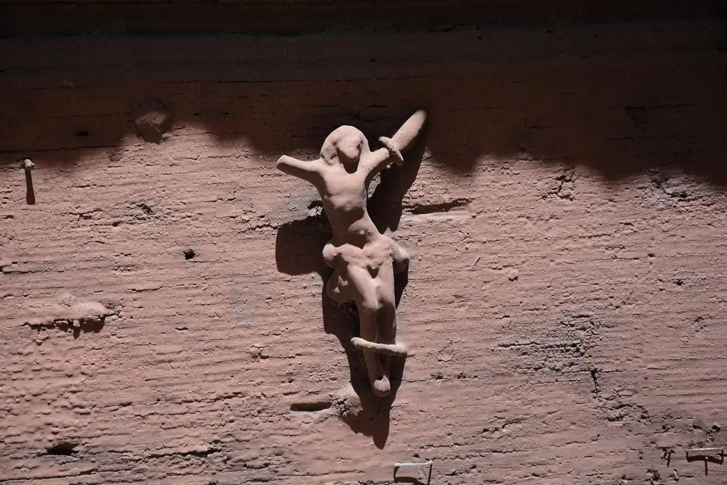 Christ pinned on a door at Occiglioni (Corsica, France 2014)