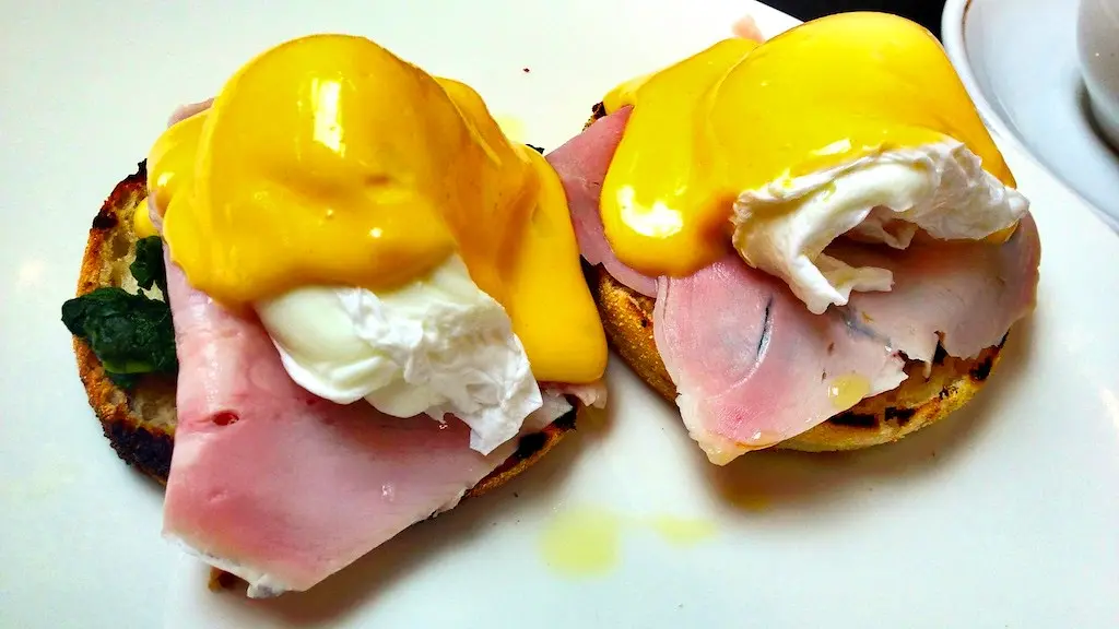 Eggs Benedict with ham and spinach at Speakeasy Kitchen in South Yarra