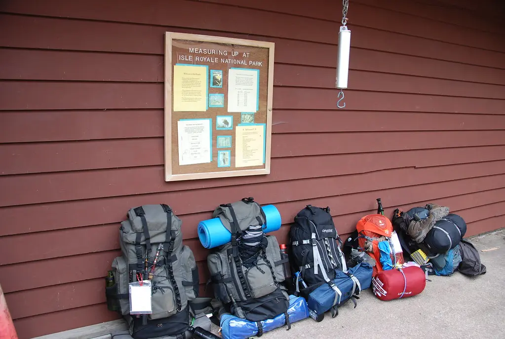 Backpacks lined up at the camp store. Rock Harbor, Isle Royale National Park, Michigan