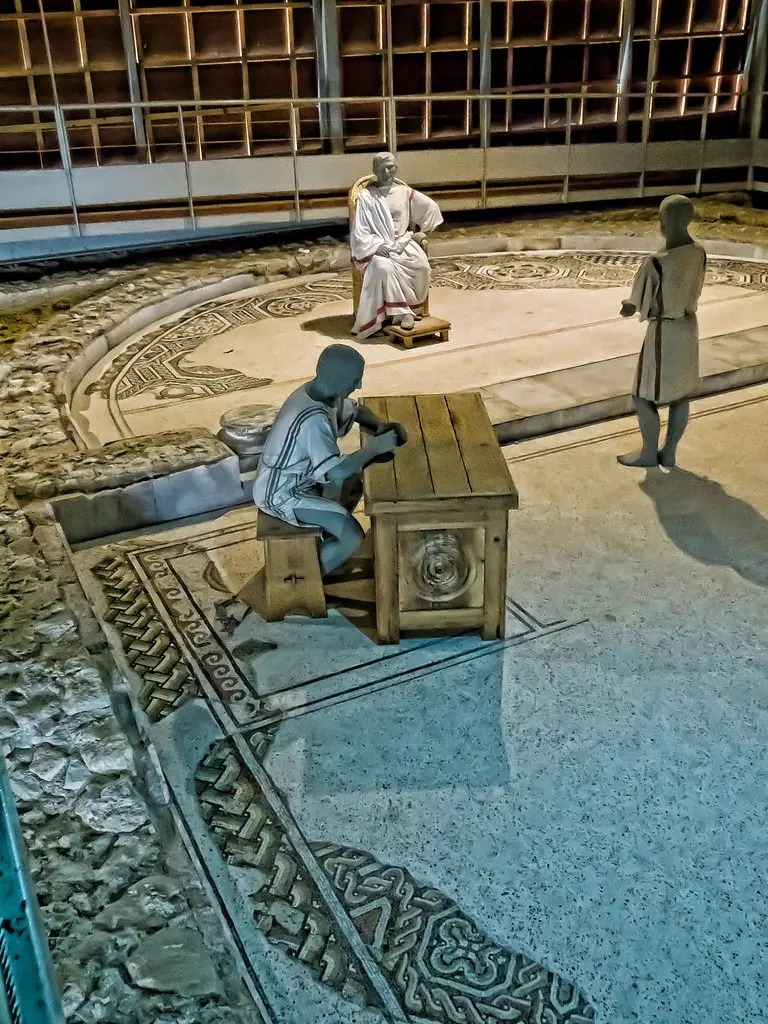 A Roman patrician surveys the mosaics of Loupian Roman Villa near Loupian, France.