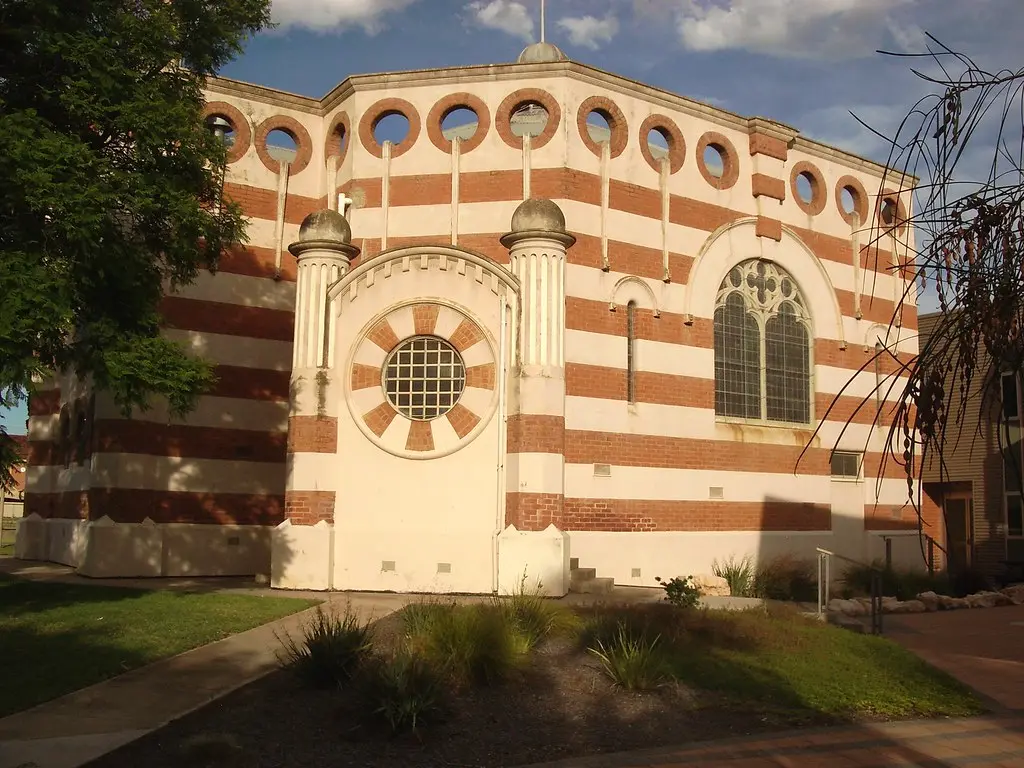 Mildura. The 1912 Methodist Church on Deakin Avenue built in Moorish style. It almost looks like a mosque. Now commerical offices and not a church . Octagonal in shape with alternating layers of red and white brick work. Designed by G.B. Leith architect.